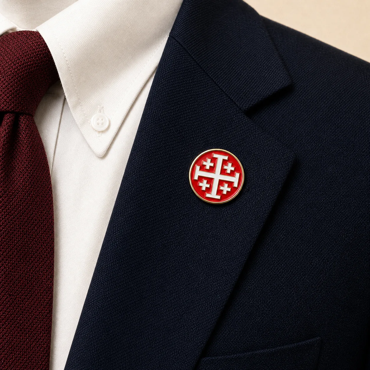Jerusalem Cross, Red/White lapel pin worn on the navy blazer